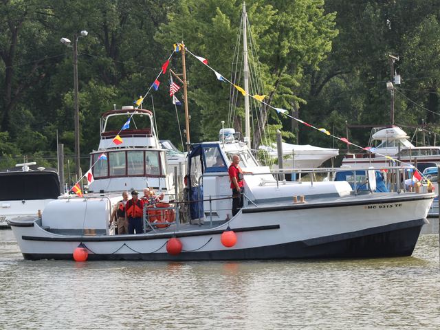 Port side of MLB 44334 showing the well deck and crew working aft