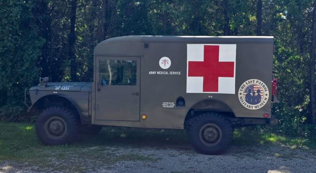 Side profile of the M725 ambulance marked U.S. Army 3F 1351