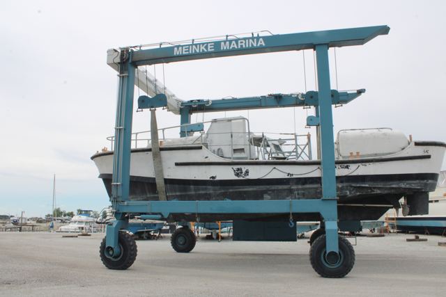 MLB 44334 being lowered by travel lift onto her trailer