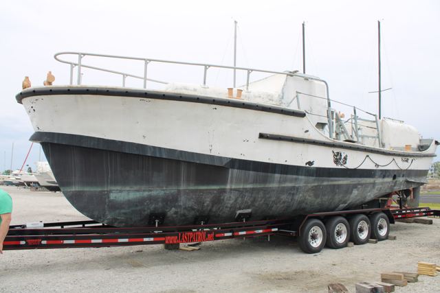Side profile of MLB 44334 on her transport trailer in the boatyard
